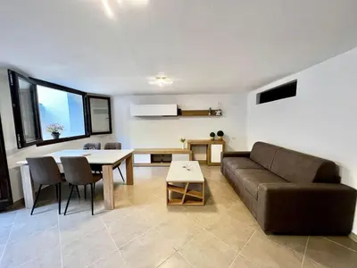 Area soggiorno di Appartamento fronte Arbatax park resort