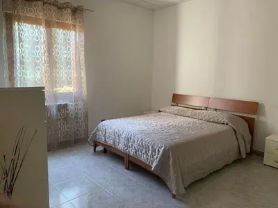 Letto o letti in una camera di VILLA A 2 passi dal mare