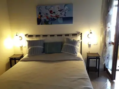 Letto o letti in una camera di Casa Costa Rei Villasimius