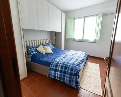 Letto o letti in una camera di Casa Nunzia
