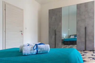 Letto o letti in una camera di Le tre C