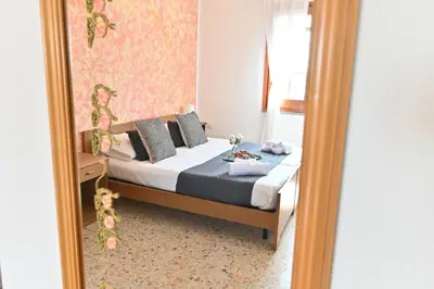 Letto o letti in una camera di IzzHome Central Room