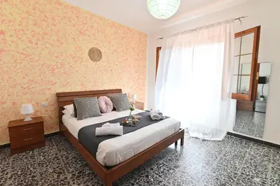 Letto o letti in una camera di IzzHome Central Room