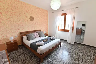 Letto o letti in una camera di IzzHome Central Room