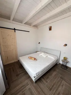 Letto o letti in una camera di Casa vacanze Iris