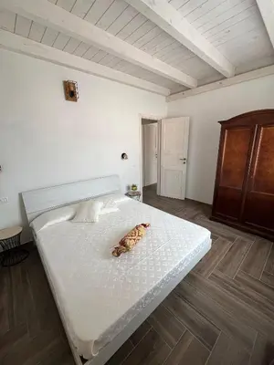 Letto o letti in una camera di Casa vacanze Iris
