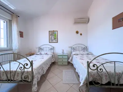 Letto o letti in una camera di Sardinia Summer Base