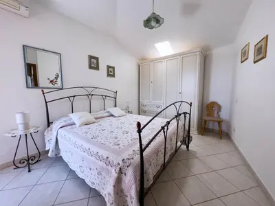 Letto o letti in una camera di Sardinia Summer Base