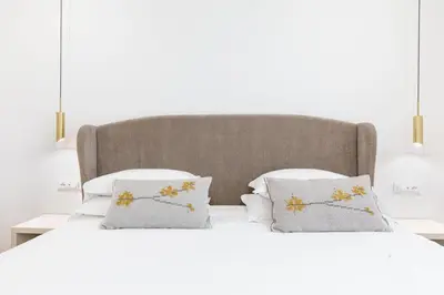 Letto o letti in una camera di Feel Boutique Rooms