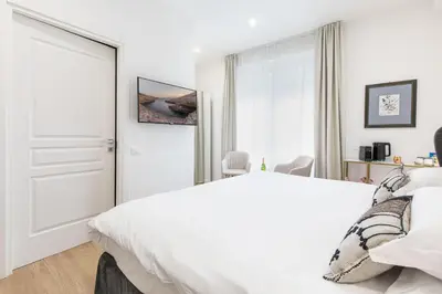 Letto o letti in una camera di Feel Boutique Rooms