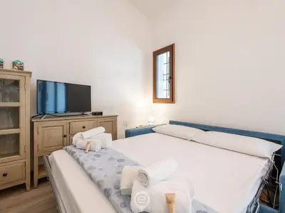 Letto o letti in una camera di Mandorli Green Retreat