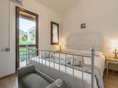 Letto o letti in una camera di Mandorli Green Retreat