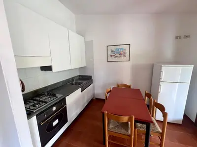 Cucina o angolo cottura di Villetta Vele 1 By La Via Del Mare Viaggi e Vacanze