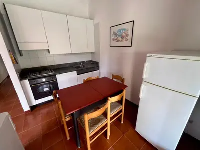 Cucina o angolo cottura di Villetta Vele 1 By La Via Del Mare Viaggi e Vacanze