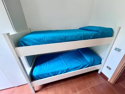 Letto o letti in una camera di Villetta Vele 2 By La Via Del Mare Viaggi e Vacanze