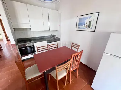 Cucina o angolo cottura di Villetta Vele 2 By La Via Del Mare Viaggi e Vacanze