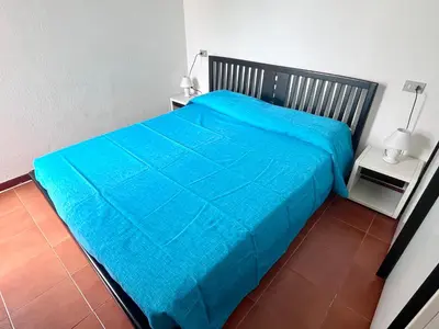 Letto o letti in una camera di Villetta Vele 2 By La Via Del Mare Viaggi e Vacanze