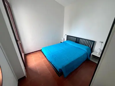 Letto o letti in una camera di Villetta Vele 2 By La Via Del Mare Viaggi e Vacanze