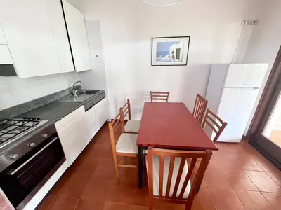 Cucina o angolo cottura di Villetta Vele 2 By La Via Del Mare Viaggi e Vacanze