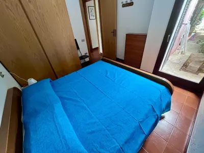 Letto o letti in una camera di Villetta Vele 6 By La Via Del Mare Viaggi e Vacanze