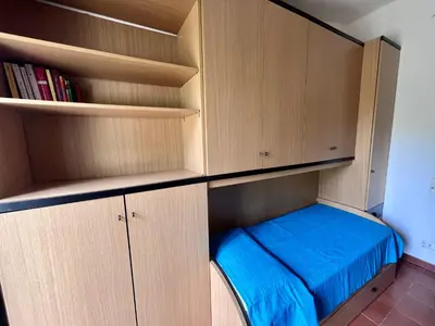 Letto o letti in una camera di Villetta Vele 6 By La Via Del Mare Viaggi e Vacanze
