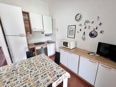 Cucina o angolo cottura di Villetta Vele 6 By La Via Del Mare Viaggi e Vacanze