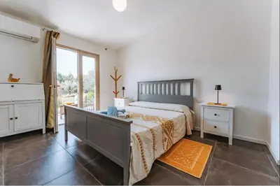 Letto o letti in una camera di Tenuta Naturale