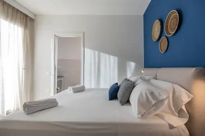 Letto o letti in una camera di Delphis Pula Rooms