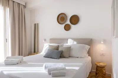 Letto o letti in una camera di Delphis Pula Rooms