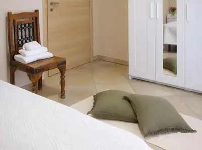 Letto o letti in una camera di Emy Guest House