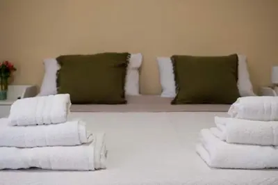 Letto o letti in una camera di Emy Guest House