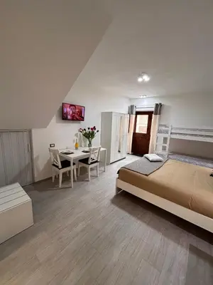 Letto o letti in una camera di Casa PEPPINA