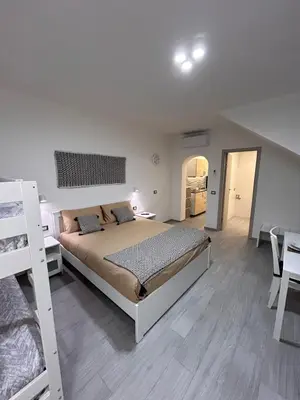 Letto o letti in una camera di Casa PEPPINA