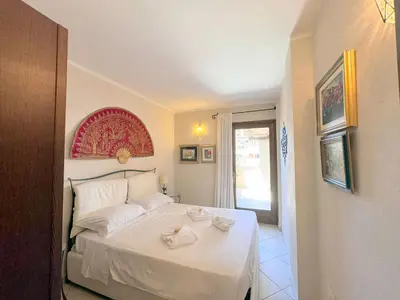 Letto o letti in una camera di Eva House