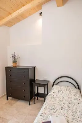 Letto o letti in una camera di Casa Torre Salinas at Casa Sardinia