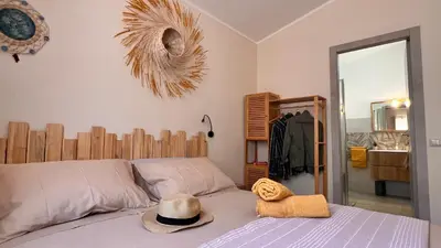 Letto o letti in una camera di Il Nido