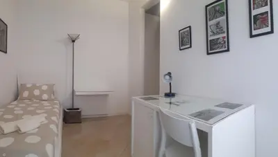 Letto o letti in una camera di Machiavelli House - Intero appartamento Cagliari