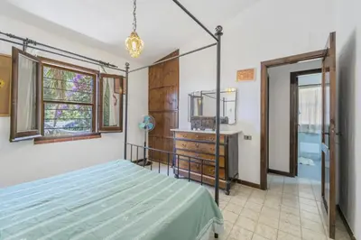 Letto o letti in una camera di a casa di nonna Cami