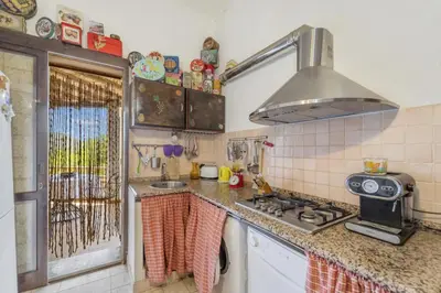 Cucina o angolo cottura di a casa di nonna Cami