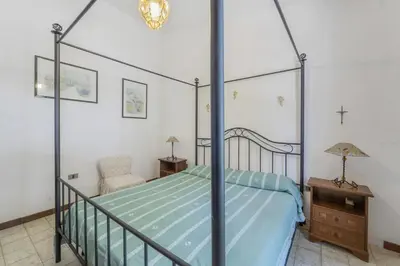 Letto o letti in una camera di a casa di nonna Cami