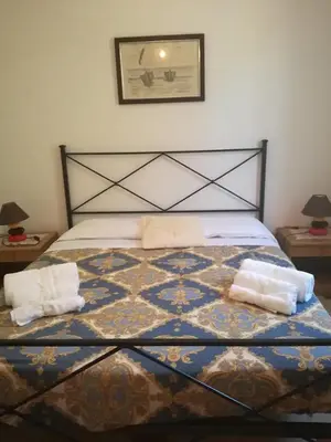 Letto o letti in una camera di Villetta relax 2