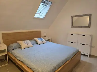 Letto o letti in una camera di SardiniaSeaHouse