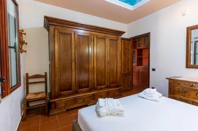Letto o letti in una camera di Villa Sa Marina con piscina