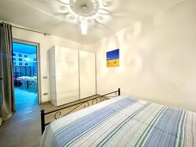 Letto o letti in una camera di La Corte Azzurra