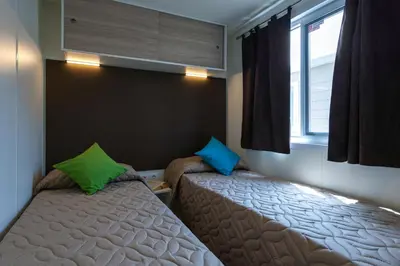 Letto o letti in una camera di Camping Village Orri