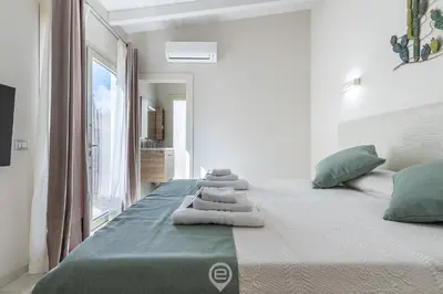 Letto o letti in una camera di Il Ginepro