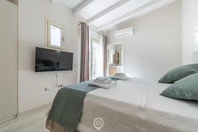 Letto o letti in una camera di Il Ginepro