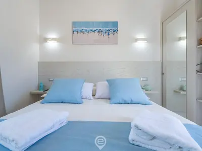 Letto o letti in una camera di Il Ginepro