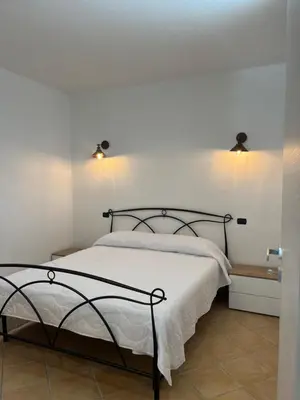 Letto o letti in una camera di Is Janas