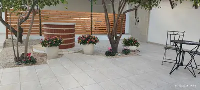 Patio o area all'aperto di Casa con giardino